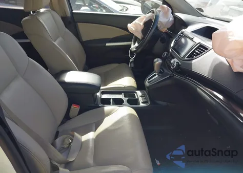 2016 Honda Cr-V Touring z USA, uszkodzony, nr VIN 5J6RM4H90GL104299